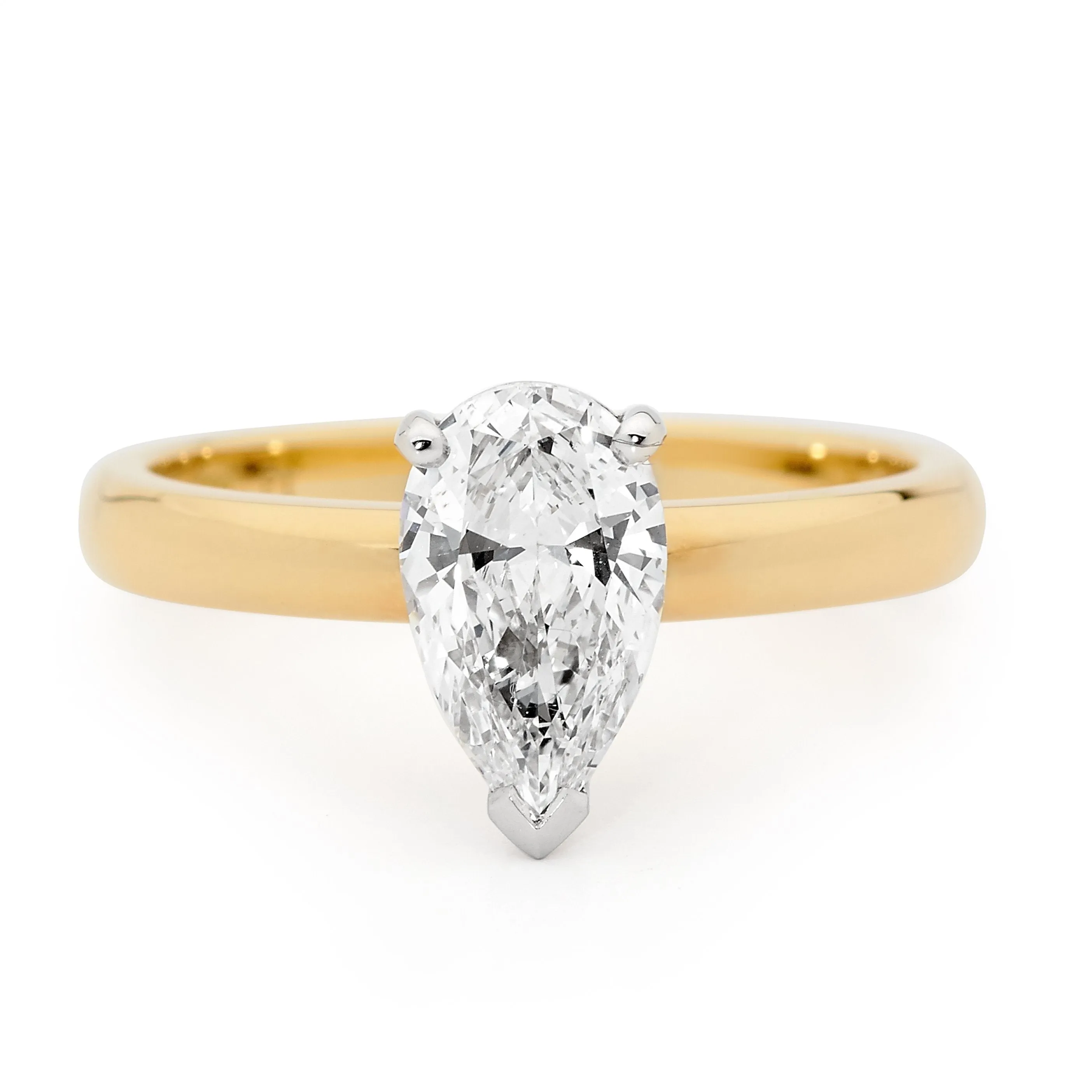 Solitaire pear cut engagement ring